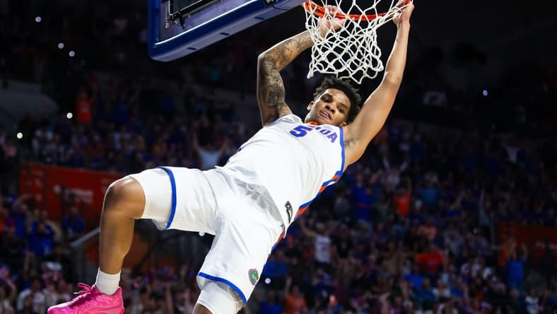 Florida Gators guard Will Richard (5) dunks the ball during the first half. The Florida men   s basketball team hosted the Alabama Crimson Tied at Exactech Arena at the Stephen C. O   Connell Center in Gainesville, FL on Tuesday, March 5, 2024. [Doug Engle/Ocala Star Banner]
