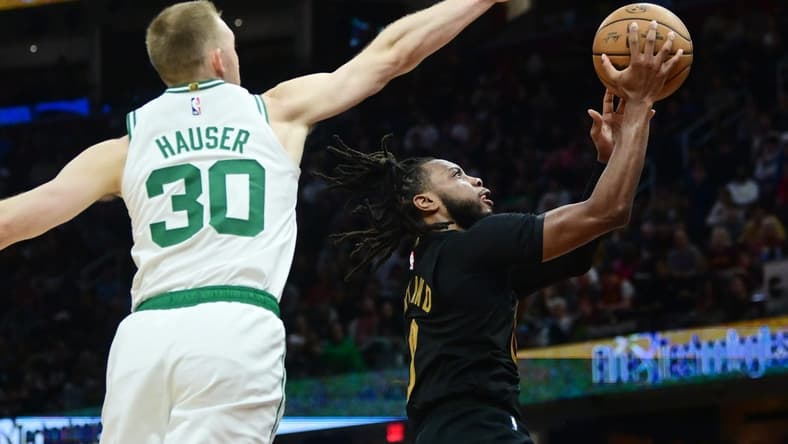 Mar 5, 2024; Cleveland, Ohio, USA; Cleveland Cavaliers guard Darius Garland (10) drives to the basket against Boston Celtics forward Sam Hauser (30) during the second half at Rocket Mortgage FieldHouse. Mandatory Credit: Ken Blaze-USA TODAY Sports