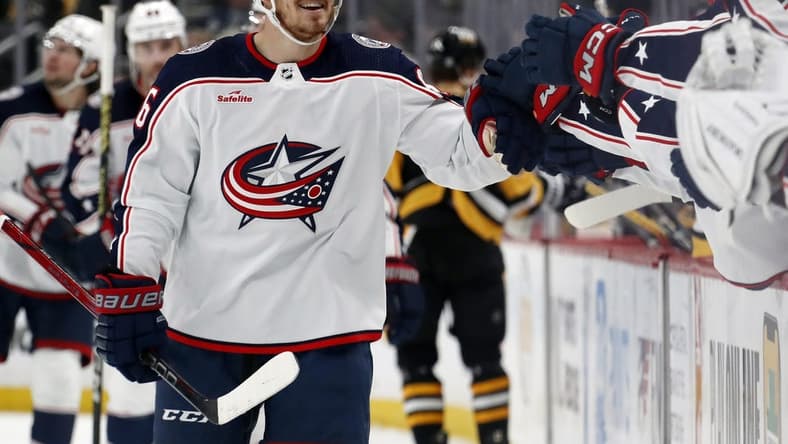 Mar 5, 2024; Pittsburgh, Pennsylvania, USA; Columbus Blue Jackets center Jack Roslovic (96) celebrates with the Blue Jackets bench after scoring a goal against the Pittsburgh Penguins during the third period at PPG Paints Arena. The Penguins won 5-3. Mandatory Credit: Charles LeClaire-USA TODAY Sports