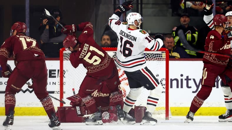 Mar 5, 2024; Tempe, Arizona, USA; Chicago Blackhawks center Jason Dickinson (16) celebrates after scoring a goal during the second period of the game against the Arizona Coyotes at Mullett Arena. Mandatory Credit: Mark J. Rebilas-USA TODAY Sports
