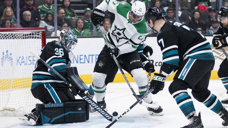 Mar 5, 2024; San Jose, California, USA; San Jose Sharks goaltender Kaapo Kahkonen (36) defends against a shot by Dallas Stars left wing Mason Marchment (27) during the first period at SAP Center at San Jose. Mandatory Credit: John Hefti-USA TODAY Sports