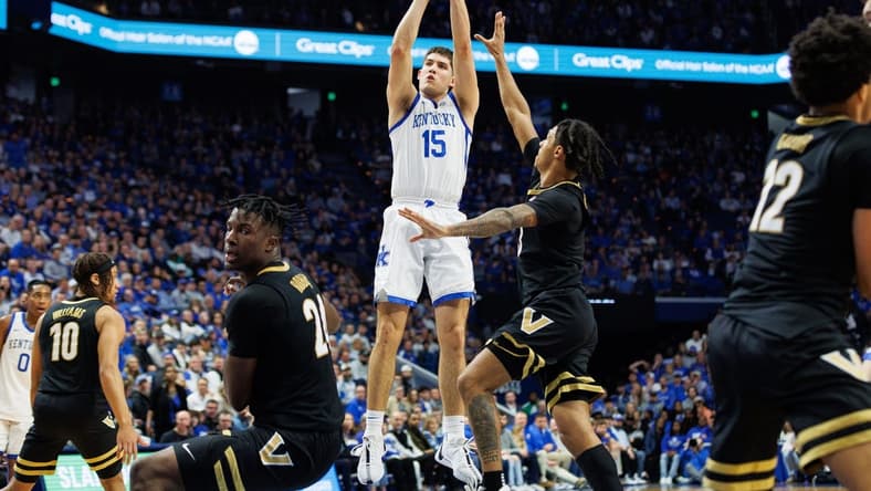 Mar 6, 2024; Lexington, Kentucky, USA; Kentucky Wildcats guard Reed Sheppard (15) shoots the ball during the second half against the Vanderbilt Commodores at Rupp Arena at Central Bank Center. Mandatory Credit: Jordan Prather-USA TODAY Sports