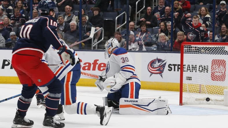 Mar 7, 2024; Columbus, Ohio, USA; the shot from Columbus Blue Jackets left wing Dmitri Voronkov (10) beats Edmonton Oilers goalie Calvin Pickard (30) for a goal during the first period at Nationwide Arena. Mandatory Credit: Russell LaBounty-USA TODAY Sports