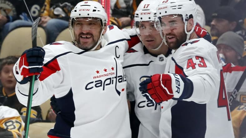 Mar 7, 2024; Pittsburgh, Pennsylvania, USA; Washington Capitals left wing Alex Ovechkin (left) celebrates his power play goal with right wing Tom Wilson (43) and center Dylan Strome (17) against the Pittsburgh Penguins during the second period at PPG Paints Arena. Mandatory Credit: Charles LeClaire-USA TODAY Sports