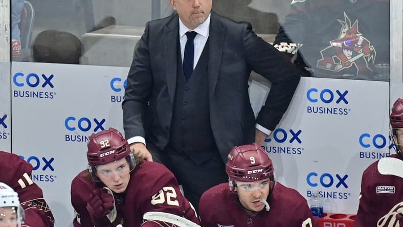 Mar 7, 2024; Tempe, Arizona, USA; Arizona Coyotes head coach Andre Tourigny looks on in the first period against the Minnesota Wild at Mullett Arena. Mandatory Credit: Matt Kartozian-USA TODAY Sports