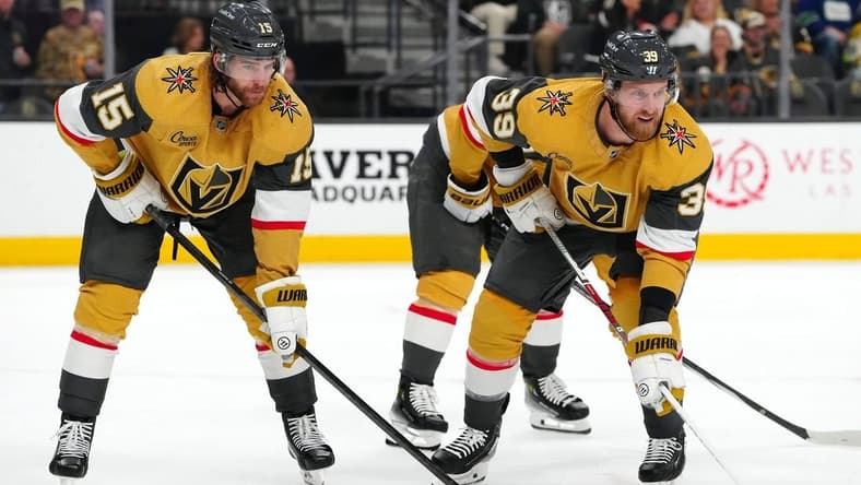 Mar 7, 2024; Las Vegas, Nevada, USA; Vegas Golden Knights defenseman Noah Hanifin (15) and Vegas Golden Knights right wing Anthony Mantha (39) await a face off against the Vancouver Canucks during the first period at T-Mobile Arena. Mandatory Credit: Stephen R. Sylvanie-USA TODAY Sports