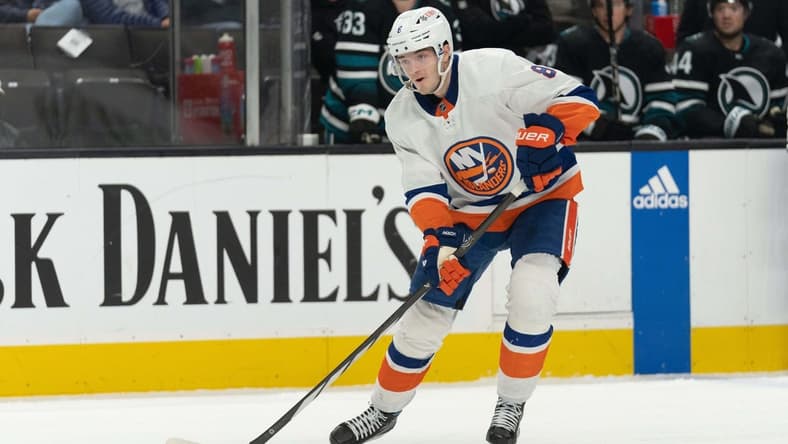Mar 7, 2024; San Jose, California, USA; New York Islanders defenseman Noah Dobson (8) looks to pass the puck during the first period against the San Jose Sharks at SAP Center at San Jose. Mandatory Credit: Stan Szeto-USA TODAY Sports