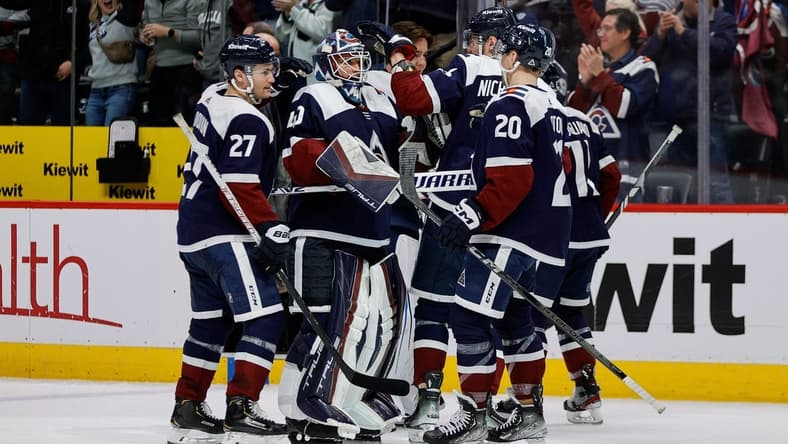 Mar 8, 2024; Denver, Colorado, USA; Colorado Avalanche goaltender Alexandar Georgiev (40) and right wing Valeri Nichushkin (13) and left wing Jonathan Drouin (27) and center Ross Colton (20) celebrate after the game against the Minnesota Wild at Ball Arena. Mandatory Credit: Isaiah J. Downing-USA TODAY Sports