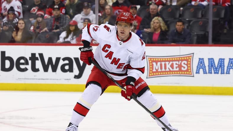 Mar 9, 2024; Newark, New Jersey, USA; Carolina Hurricanes center Evgeny Kuznetsov (92) against the New Jersey Devils during the first period at Prudential Center. Mandatory Credit: Ed Mulholland-USA TODAY Sports