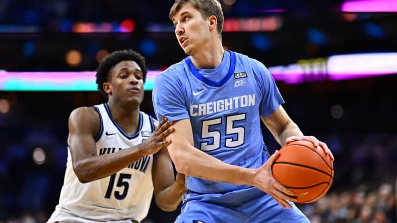 Mar 9, 2024; Philadelphia, Pennsylvania, USA; Creighton Bluejays guard Baylor Scheierman (55) controls the ball against Villanova Wildcats guard Jordan Longino (15) in the first half at Wells Fargo Center. Mandatory Credit: Kyle Ross-USA TODAY Sports
