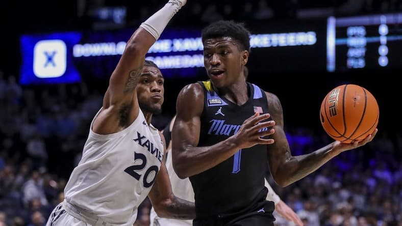 Mar 9, 2024; Cincinnati, Ohio, USA; Marquette Golden Eagles guard Kam Jones (1) dribbles against Xavier Musketeers guard Dayvion McKnight (20) in the first half at Cintas Center. Mandatory Credit: Katie Stratman-USA TODAY Sports