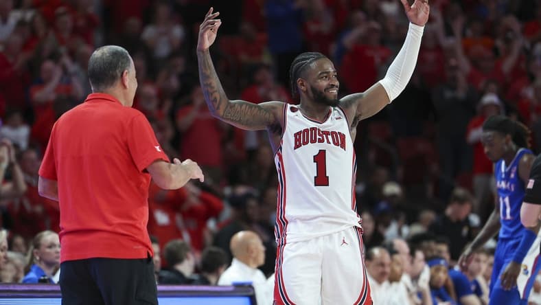 Mar 9, 2024; Houston, Texas, USA; Houston Cougars guard Jamal Shead (1) acknowledges the crowd after coming out of the game during the second half against the Kansas Jayhawks at Fertitta Center. Mandatory Credit: Troy Taormina-USA TODAY Sports