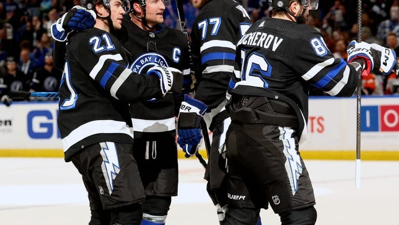 Mar 9, 2024; Tampa, Florida, USA; Tampa Bay Lightning center Brayden Point (21) celebrates after scoring a goal against the Philadelphia Flyers during the first period at Amalie Arena. Mandatory Credit: Kim Klement Neitzel-USA TODAY Sports