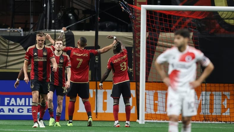 Mar 9, 2024; Atlanta, Georgia, USA; Atlanta United forward Giorgos Giakoumakis (7) celebrates his goal against the New England Revolution in the second half at Mercedes-Benz Stadium. Mandatory Credit: Brett Davis-USA TODAY Sports