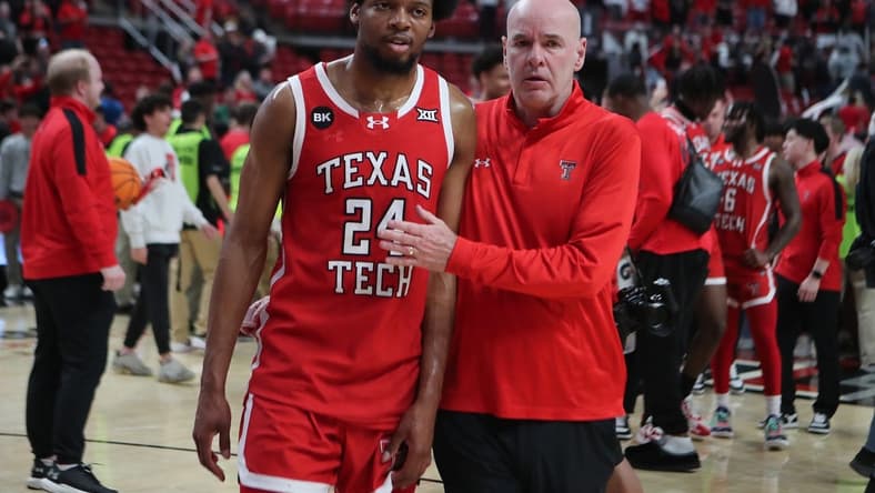 Mar 9, 2024; Lubbock, Texas, USA;  Texas Tech Red Raiders guard Kerwin Walton (24) with assistant coach Dave Smart after the game against the Baylor Bears at United Supermarkets Arena. Mandatory Credit: Michael C. Johnson-USA TODAY Sports