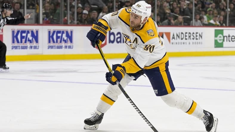 Mar 10, 2024; Saint Paul, Minnesota, USA;  Nashville Predators forward Ryan O'Reilly (90) scores a power play goal against the Minnesota Wild during the third period at Xcel Energy Center. Mandatory Credit: Nick Wosika-USA TODAY Sports