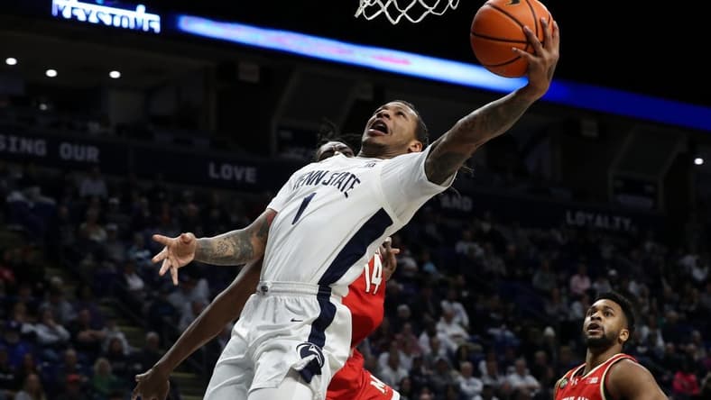 Mar 10, 2024; University Park, Pennsylvania, USA; Penn State Nittany Lions guard Ace Baldwin Jr (1) drives the ball to the basket during the first half against the Maryland Terrapins at Bryce Jordan Center. Mandatory Credit: Matthew O'Haren-USA TODAY Sports