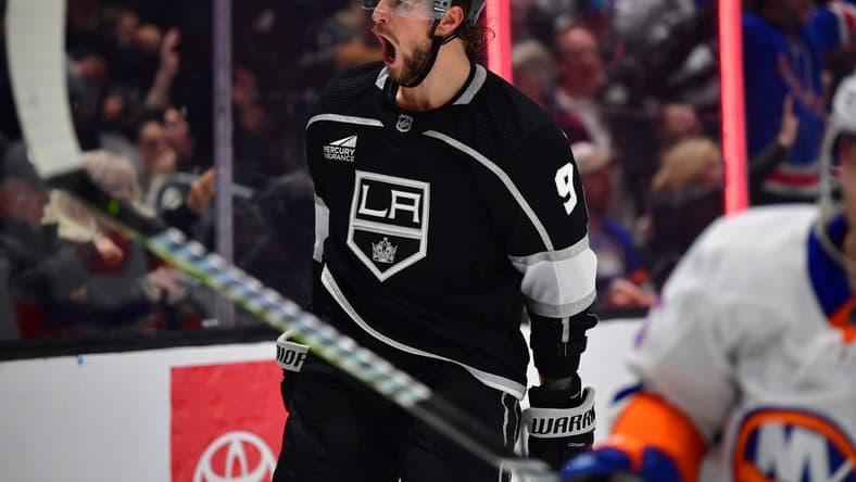 Mar 11, 2024; Los Angeles, California, USA;  Los Angeles Kings right wing Adrian Kempe (9) celebrates his goal scored against the against the New York Islanders during the second period at Crypto.com Arena. Mandatory Credit: Gary A. Vasquez-USA TODAY Sports