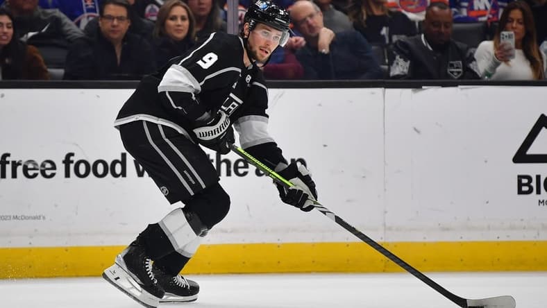 Mar 11, 2024; Los Angeles, California, USA; Los Angeles Kings right wing Adrian Kempe (9) controls the puck against the New York Islanders during the second period at Crypto.com Arena. Mandatory Credit: Gary A. Vasquez-USA TODAY Sports