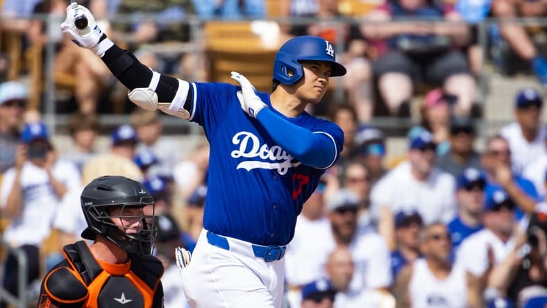 Mar 12, 2024; Phoenix, Arizona, USA; Los Angeles Dodgers designated hitter Shohei Ohtani against the San Francisco Giants during a spring training baseball game at Camelback Ranch-Glendale. Mandatory Credit: Mark J. Rebilas-USA TODAY Sports