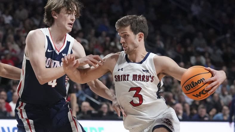 March 12, 2024; Las Vegas, NV, USA; Saint Mary's Gaels guard Augustas Marciulionis (3) dribbles the basketball against Gonzaga Bulldogs guard Dusty Stromer (4) during the first half in the finals of the WCC Basketball Championship at Orleans Arena. Mandatory Credit: Kyle Terada-USA TODAY Sports