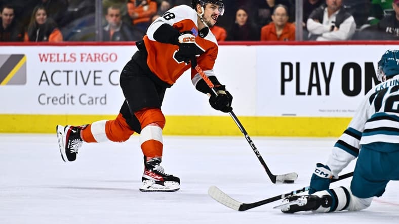 Mar 12, 2024; Philadelphia, Pennsylvania, USA; Philadelphia Flyers center Morgan Frost (48) shoots against the San Jose Sharks in the third period at Wells Fargo Center. Mandatory Credit: Kyle Ross-USA TODAY Sports