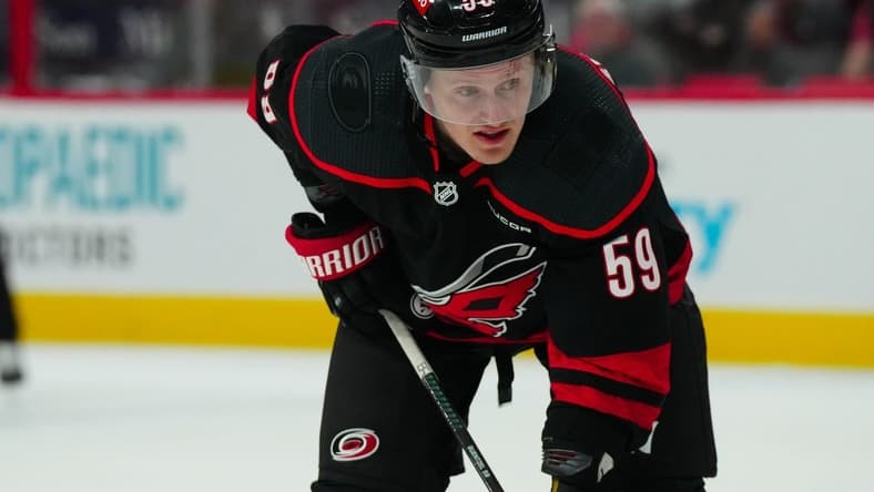 Mar 12, 2024; Raleigh, North Carolina, USA; Carolina Hurricanes left wing Jake Guentzel (59) looks on against the New York Rangers during the third period at PNC Arena. Mandatory Credit: James Guillory-USA TODAY Sports