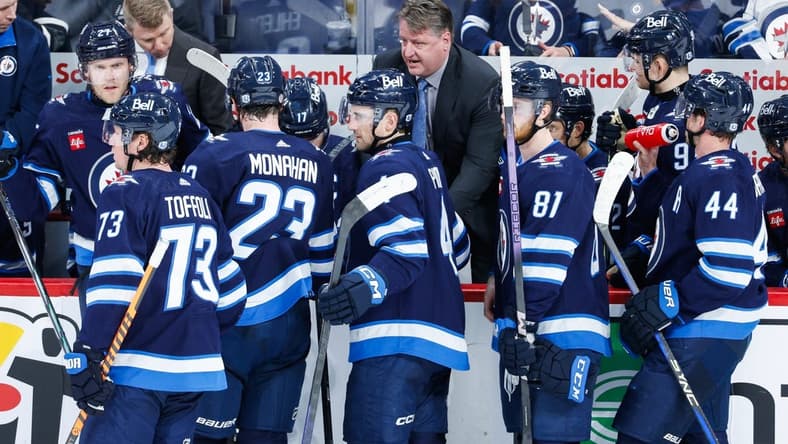 Mar 13, 2024; Winnipeg, Manitoba, CAN; Winnipeg Jets assistant coach Brad Lauer discusses strategy against the Nashville Predators during the third period at Canada Life Centre. Mandatory Credit: Terrence Lee-USA TODAY Sports