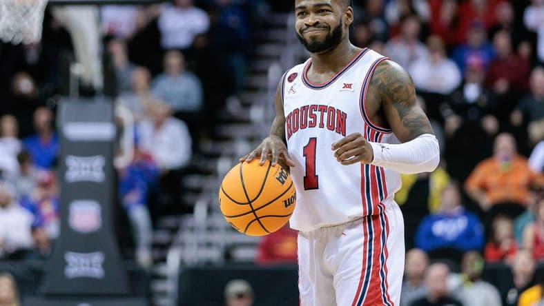 Mar 14, 2024; Kansas City, MO, USA; Houston Cougars guard Jamal Shead (1) brings the ball up court during the first half against the TCU Horned Frogs at T-Mobile Center. Mandatory Credit: William Purnell-USA TODAY Sports