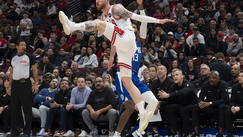 Mar 14, 2024; Chicago, Illinois, USA; Chicago Bulls forward Onuralp Bitim (17) defends against LA Clippers forward Paul George (13) during the first half at the United Center. Mandatory Credit: Matt Marton-USA TODAY Sports
