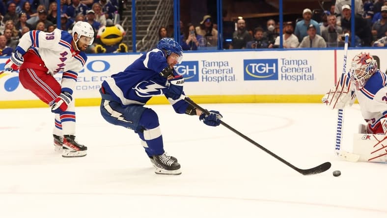 Mar 14, 2024; Tampa, Florida, USA; Tampa Bay Lightning right wing Nikita Kucherov (86) shoots on New York Rangers goaltender Igor Shesterkin (31) as defenseman K'Andre Miller (79) defends during the third period at Amalie Arena. Mandatory Credit: Kim Klement Neitzel-USA TODAY Sports