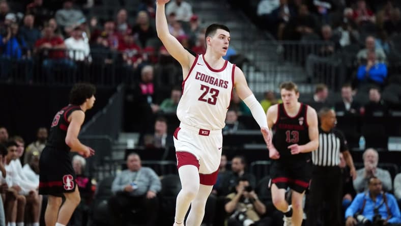 Mar 14, 2024; Las Vegas, NV, USA; Washington State Cougars forward Andrej Jakimovski (23) celebrates after a three-point basket against the Stanford Cardinal in the first half att T-Mobile Arena. Mandatory Credit: Kirby Lee-USA TODAY Sports