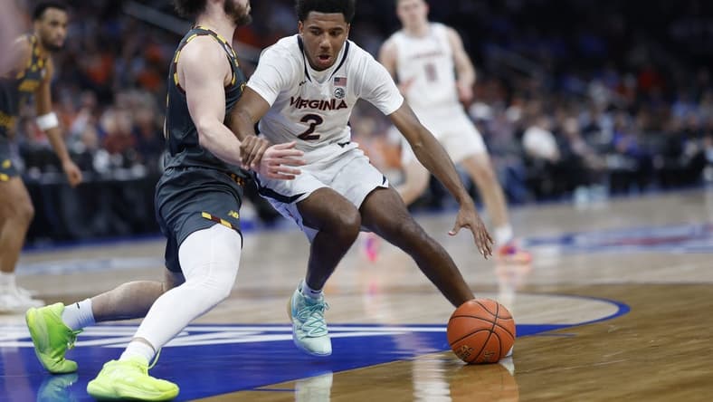 Mar 14, 2024; Washington, D.C., USA; Virginia Cavaliers guard Reece Beekman (2) drives to the basket as Boston College Eagles guard Jaeden Zackery (3) defends in the first half at Capital One Arena. Mandatory Credit: Geoff Burke-USA TODAY Sports