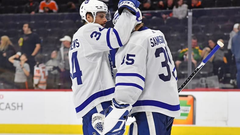 Mar 14, 2024; Philadelphia, Pennsylvania, USA; Toronto Maple Leafs center Auston Matthews (34) and goaltender Ilya Samsonov (35) celebrate win against the Philadelphia Flyers  at Wells Fargo Center. Mandatory Credit: Eric Hartline-USA TODAY Sports
