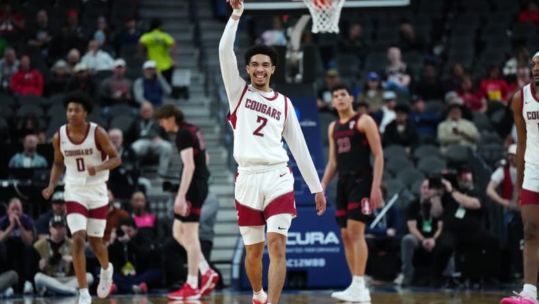 Mar 14, 2024; Las Vegas, NV, USA; Washington State Cougars guard Myles Rice (2) celebrates in the first half against the Stanford Cardinal at T-Mobile Arena. Mandatory Credit: Kirby Lee-USA TODAY Sports