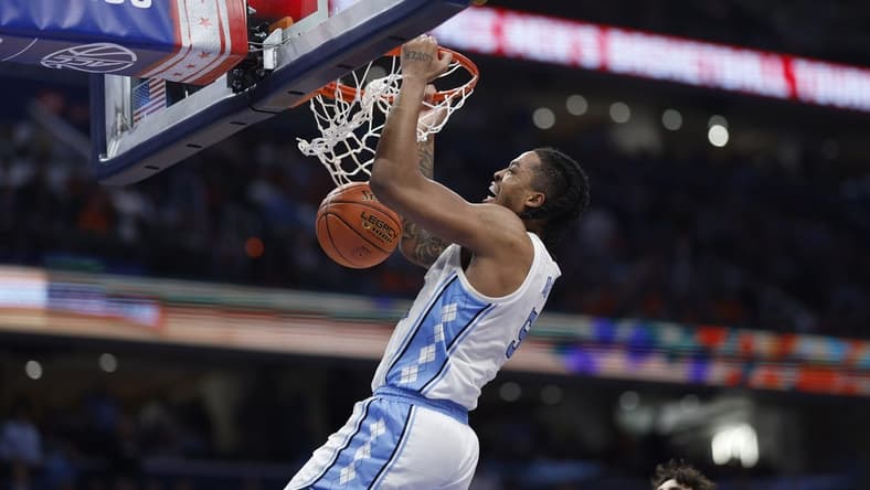 Mar 15, 2024; Washington, D.C., USA; North Carolina Tar Heels forward Armando Bacot (5) dunks the ball against the Pittsburgh Panthers in the second half at Capital One Arena. Mandatory Credit: Geoff Burke-USA TODAY Sports