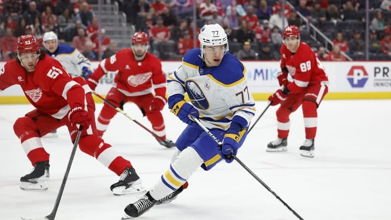 Mar 16, 2024; Detroit, Michigan, USA;  Buffalo Sabres right wing JJ Peterka (77) skates with the puck in the first period against the Detroit Red Wings at Little Caesars Arena. Mandatory Credit: Rick Osentoski-USA TODAY Sports