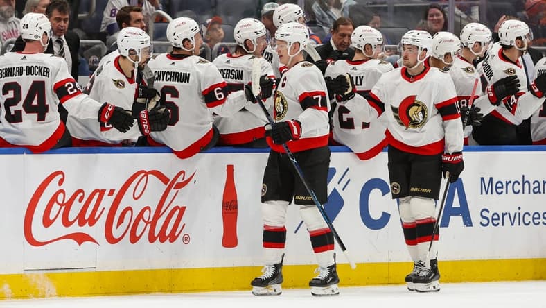 Mar 16, 2024; Elmont, New York, USA;  Ottawa Senators left wing Brady Tkachuk (7) celebrates his goal against the New York Islanders during the second period at UBS Arena. Mandatory Credit: Thomas Salus-USA TODAY Sports