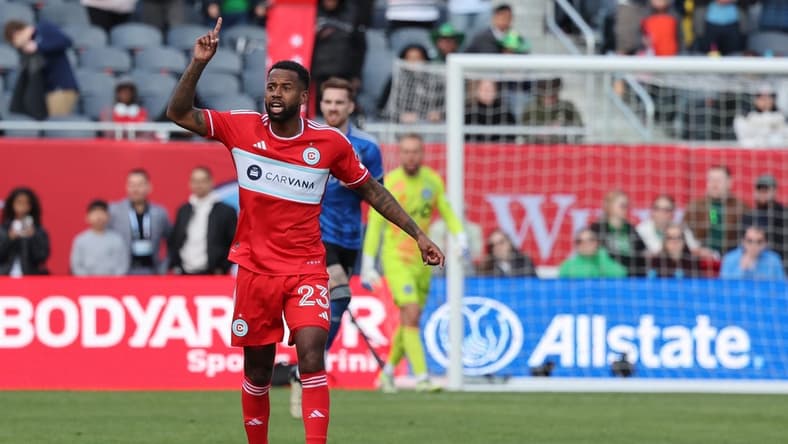 Mar 16, 2024; Chicago, Illinois, USA; Chicago Fire FC midfielder Kellyn Acosta (23) celebrates after scoring a goal on a long kick against CF Montreal during the second half at Soldier Field. Mandatory Credit: Mike Dinovo-USA TODAY Sports