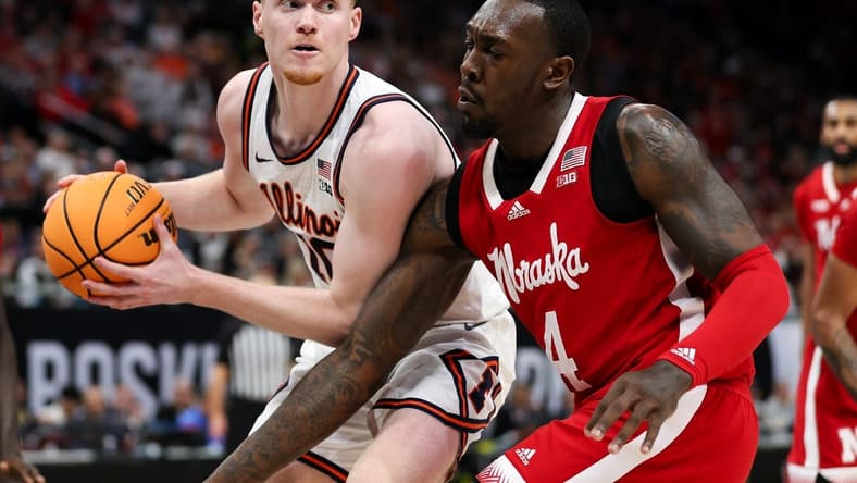 Mar 16, 2024; Minneapolis, MN, USA; Illinois Fighting Illini guard Luke Goode (10) controls the ball as Nebraska Cornhuskers forward Juwan Gary (4) defends during the first half at Target Center. Mandatory Credit: Matt Krohn-USA TODAY Sports