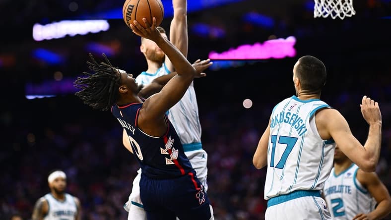 Mar 16, 2024; Philadelphia, Pennsylvania, USA; Philadelphia 76ers guard Tyrese Maxey (0) shoots against Charlotte Hornets forward Davis Bertans (9) in the second quarter at Wells Fargo Center. Mandatory Credit: Kyle Ross-USA TODAY Sports