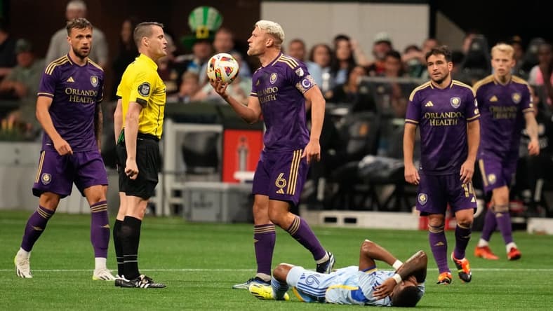 Mar 17, 2024; Atlanta, Georgia, USA; Orlando City defender Robin Jansson (6) reacts after a call during the second half against Atlanta United at Mercedes-Benz Stadium. Mandatory Credit: Dale Zanine-USA TODAY Sports
