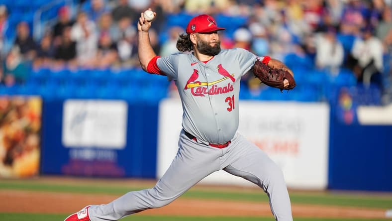 Mar 19, 2024; Port St. Lucie, Florida, USA; St. Louis Cardinals starting pitcher Lance Lynn (31) throws a pitch against the New York Mets during the first inning at Clover Park. Mandatory Credit: Rich Storry-USA TODAY Sports
