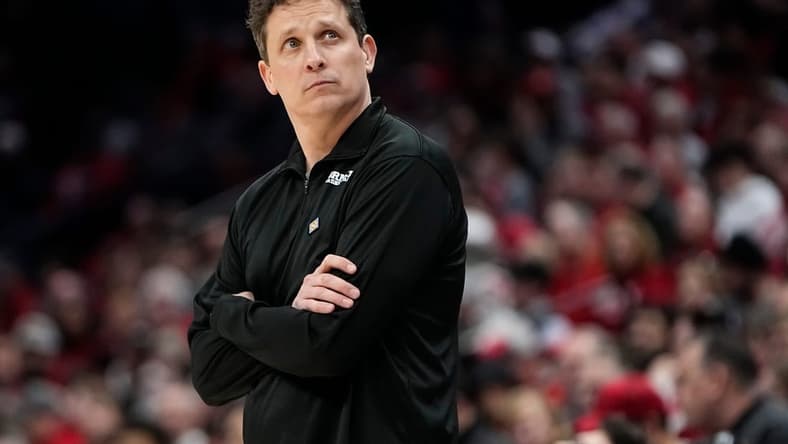 Mar 19, 2024; Columbus, OH, USA; Cornell Big Red head coach Brian Earl watches during the first half of the NIT basketball game against the Ohio State Buckeyes at Value City Arena.