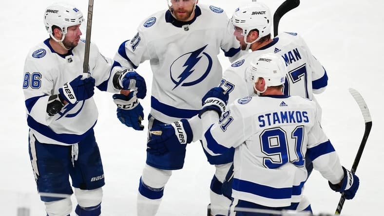 Mar 19, 2024; Las Vegas, Nevada, USA; Tampa Bay Lightning right wing Nikita Kucherov (86) celebrates with team mates after scoring an empty net goal against the Vegas Golden Knights during the third period at T-Mobile Arena. Mandatory Credit: Stephen R. Sylvanie-USA TODAY Sports