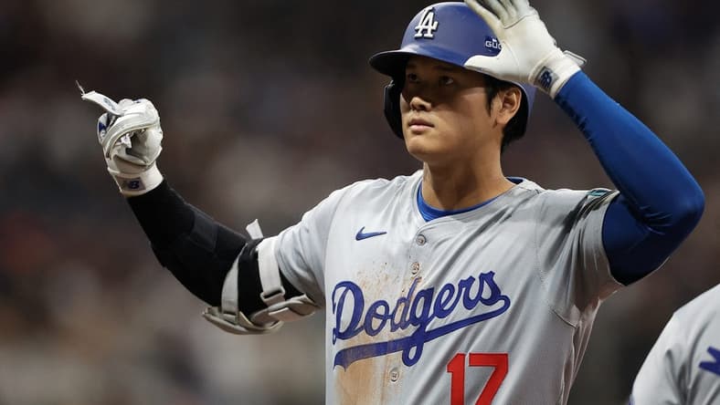 [US, Mexico & Canada customers only] March 20, 2024; Seoul, SOUTH KOREA; Los Angeles Dodgers player Shohei Ohtani reacts against the San Diego Padres during a MLB regular season Seoul Series game at Gocheok Sky Dome. Mandatory Credit: Kim Hong-Ji/Reuters via USA TODAY Sports