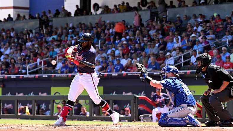 Mar 20, 2024; North Port, Florida, USA; Atlanta Braves center fielder Michael Harris III (23) gets on base with a fielders choice in the second inning of a spring training game against the Toronto Blue Jays  at CoolToday Park. Mandatory Credit: Jonathan Dyer-USA TODAY Sports