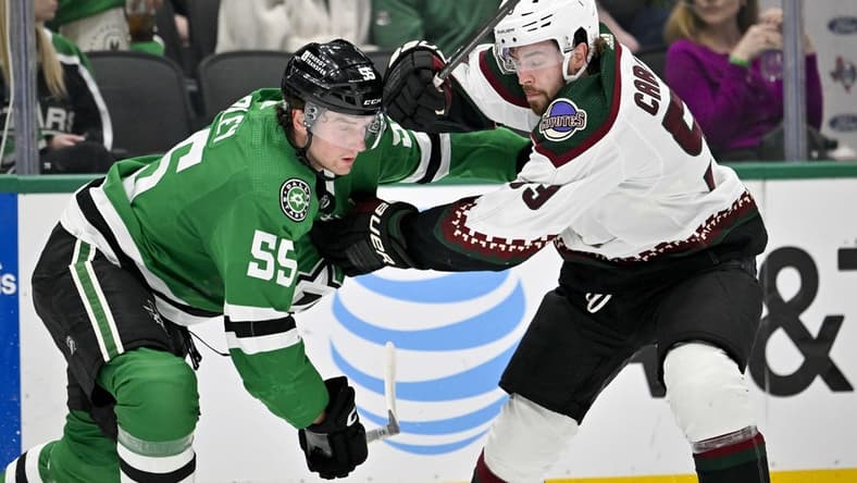 Mar 20, 2024; Dallas, Texas, USA; Arizona Coyotes left wing Michael Carcone (53) tries to skate past Dallas Stars defenseman Thomas Harley (55) during the first period at the American Airlines Center. Mandatory Credit: Jerome Miron-USA TODAY Sports
