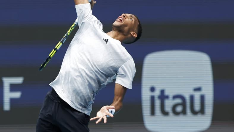 Mar 21, 2024; Miami Gardens, FL, USA; Felix Auger-Aliassime (CAN) serves against Adam Walton (AUS)(not pictured) on day four of the Miami Open at Hard Rock Stadium. Mandatory Credit: Geoff Burke-USA TODAY Sports