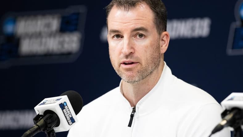 Mar 21, 2024; Indianapolis, IN, USA; Utah State Aggies head coach Danny Sprinkle talks to the media during the practice day at Gainbridge FieldHouse. Mandatory Credit: Trevor Ruszkowski-USA TODAY Sports
